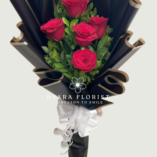 Elegant red rose bouquet with black premium wrapping by Kyara Florist