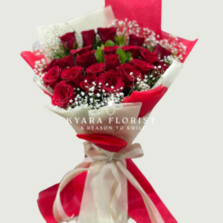 Red rose hand bouquet with gypsophila by Kyara Florist Ahmedabad