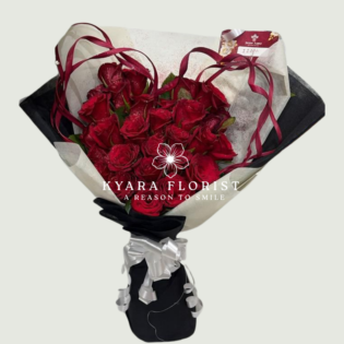 Luxury red rose bouquet with black and white wrapping by Kyara Florist