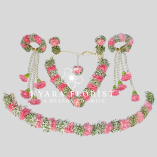 Pink carnation and baby's breath floral jewelry set with pearl droplets
