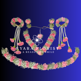 Pink carnation and baby's breath floral jewelry set with pearl droplets