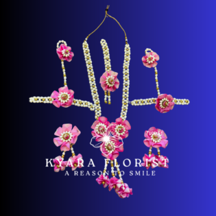 Handcrafted pink rose and white pearl floral jewelry set for Haldi and Mehendi