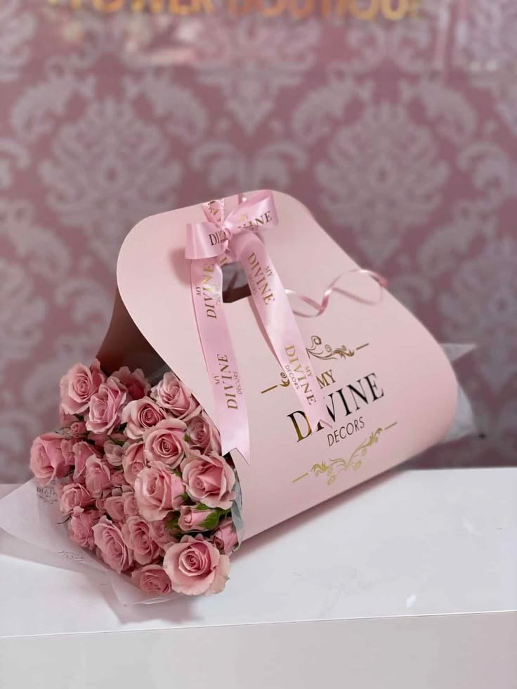 Luxury velvet round hatbox and designer floral handbag arrangements in Ahmedabad